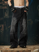NOMANIAI Loose-fit, washed, and distressed jeans with 3D tailoring.