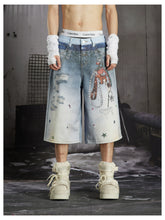 NOMANIAI Y2K-style loose-fit cropped pants featuring a triple-waistband design and chain charm detail.