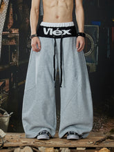 NOMANIAI Street-style double-waistband sweatpants with attached skirt detail – casual dance pants.
