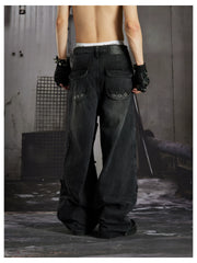 NOMANIAI Panel-construction straight-leg jeans with rivets and a distressed wash.