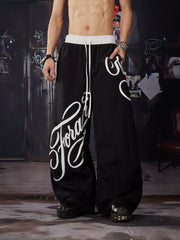 NOMANIAI Sporty Street-Style Printed Elastic-Waist Casual Paratrooper Pants.
