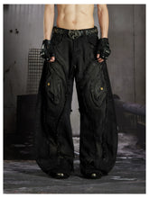 NOMANIAI Heavy-duty distressed loose-fit curved-seam jeans.