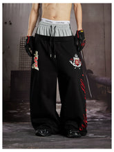 NOMANIAI Street-style loose-fit casual trousers with double-waistband embroidery.