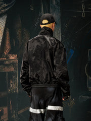 NOMANIAI Glossy-finish custom embroidered zip-up jacket.