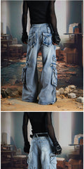 NOMANIAI Multi-pocket deconstructed, washed, and distressed workwear-style denim jeans.