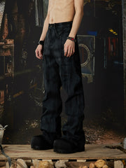 NOMANIAI Dark-coated rivet micro-flared jeans.