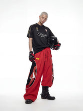 NOMANIAI Deconstructed Color-Block Loose-Fit Moto Pants.