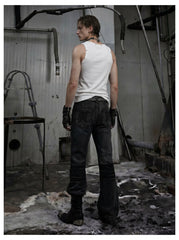 NOMANIAI Distressed, slim-fit, slight-flare jeans with studs—dark streetwear style.
