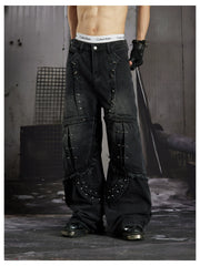 NOMANIAI Panel-construction straight-leg jeans with rivets and a distressed wash.