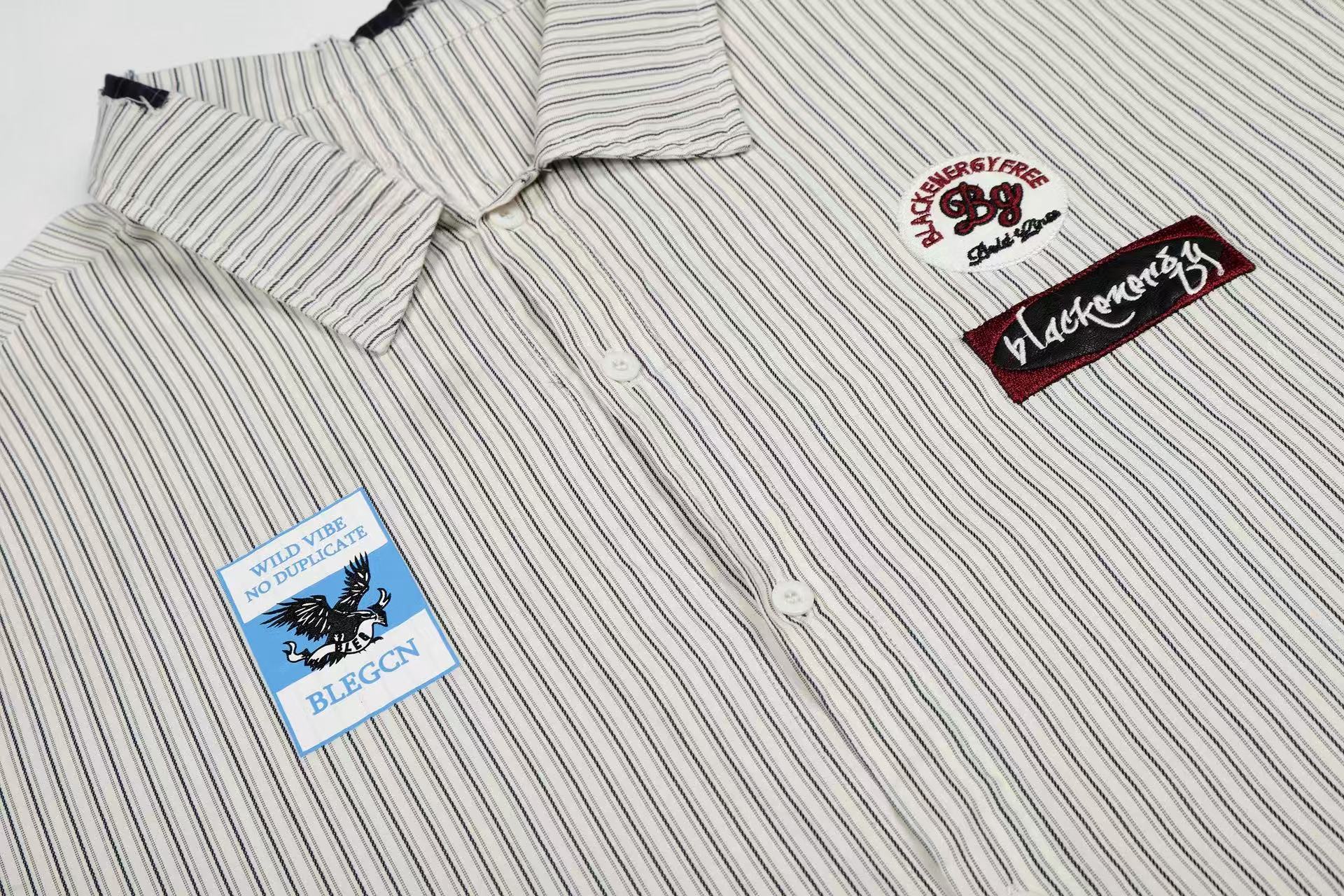 Omirad “Pinstripe Patch Graphic Shirt”