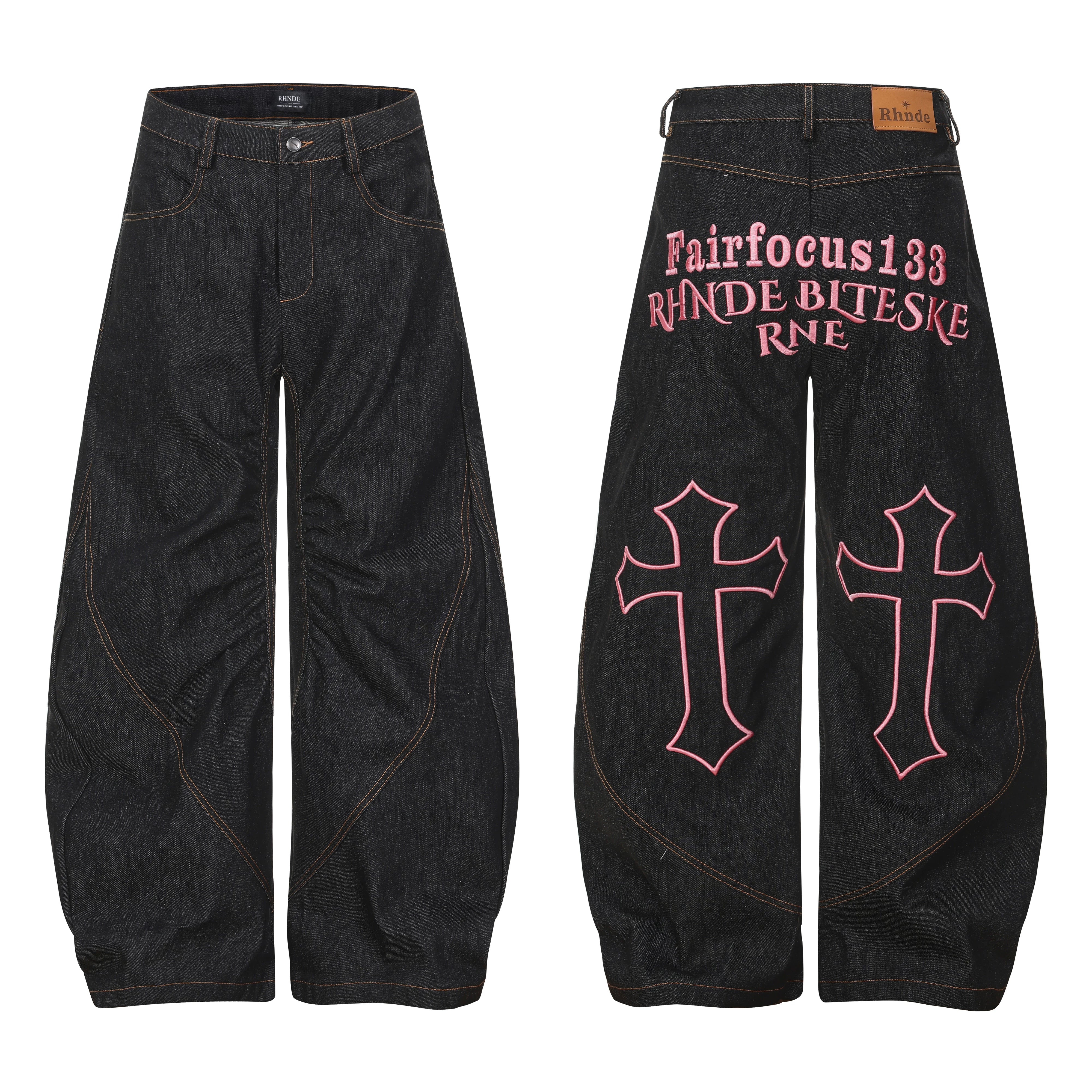 NOMANIAI Heavy-duty embroidered color-block pleated curved-seam jeans.