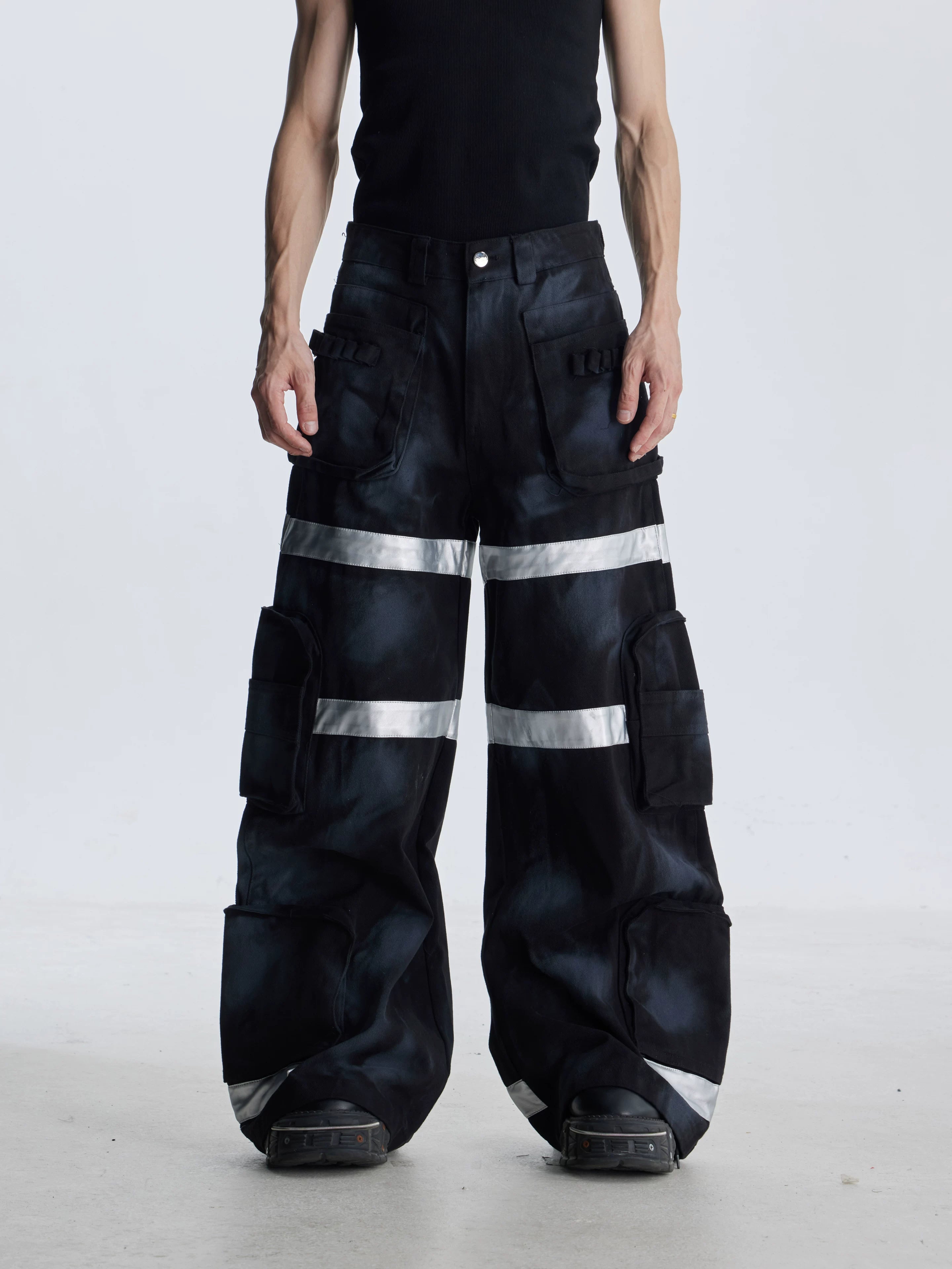 NOMANIAI Heavy-duty streetwear wide-leg denim trousers.