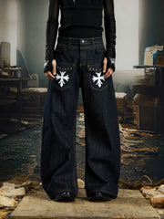 NOMANIAI  Printed, studded, deconstructed "Scimitar" jeans—versatile trousers.