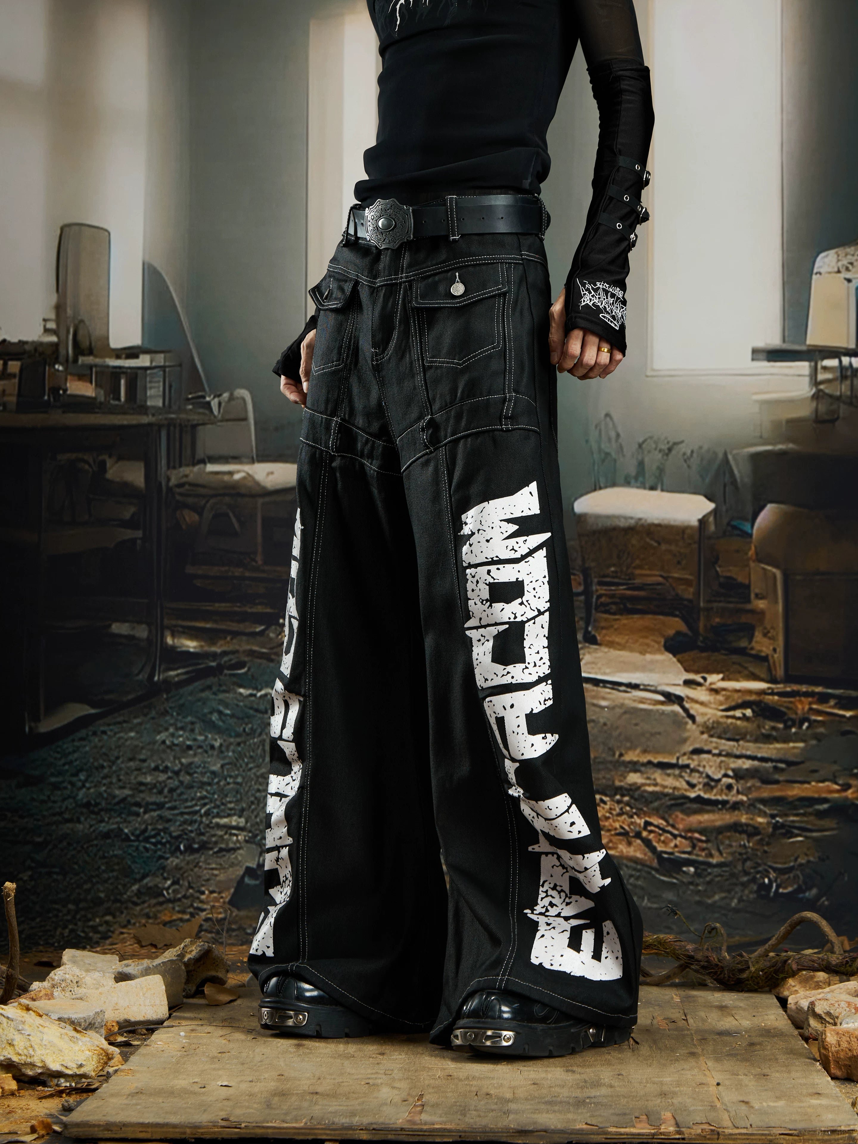 NOMANIAI Coated Loose-Fit Jeans with Large Letter Print.