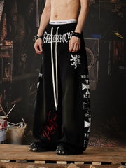 NOMANIAI Light-toned totem print Y2K loose-fit casual pants.
