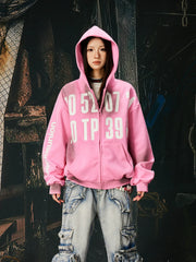 NOMANIAI  Oversized Printed Distressed Zip-Up Hoodie.