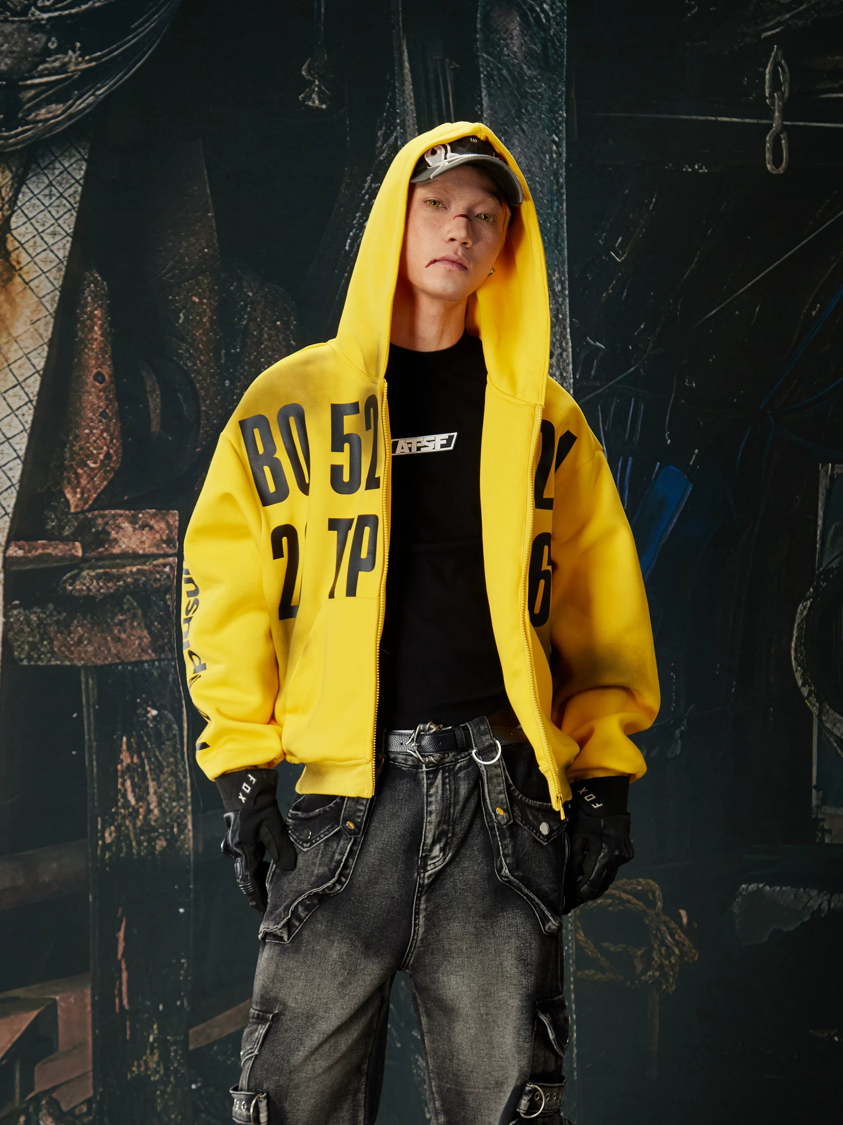 NOMANIAI  Oversized Printed Distressed Zip-Up Hoodie.