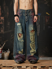 NOMANIAI Distressed jeans with a double-waistband design and cutouts.