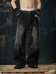 NOMANIAI Loose-fit, washed, and distressed jeans with 3D tailoring.