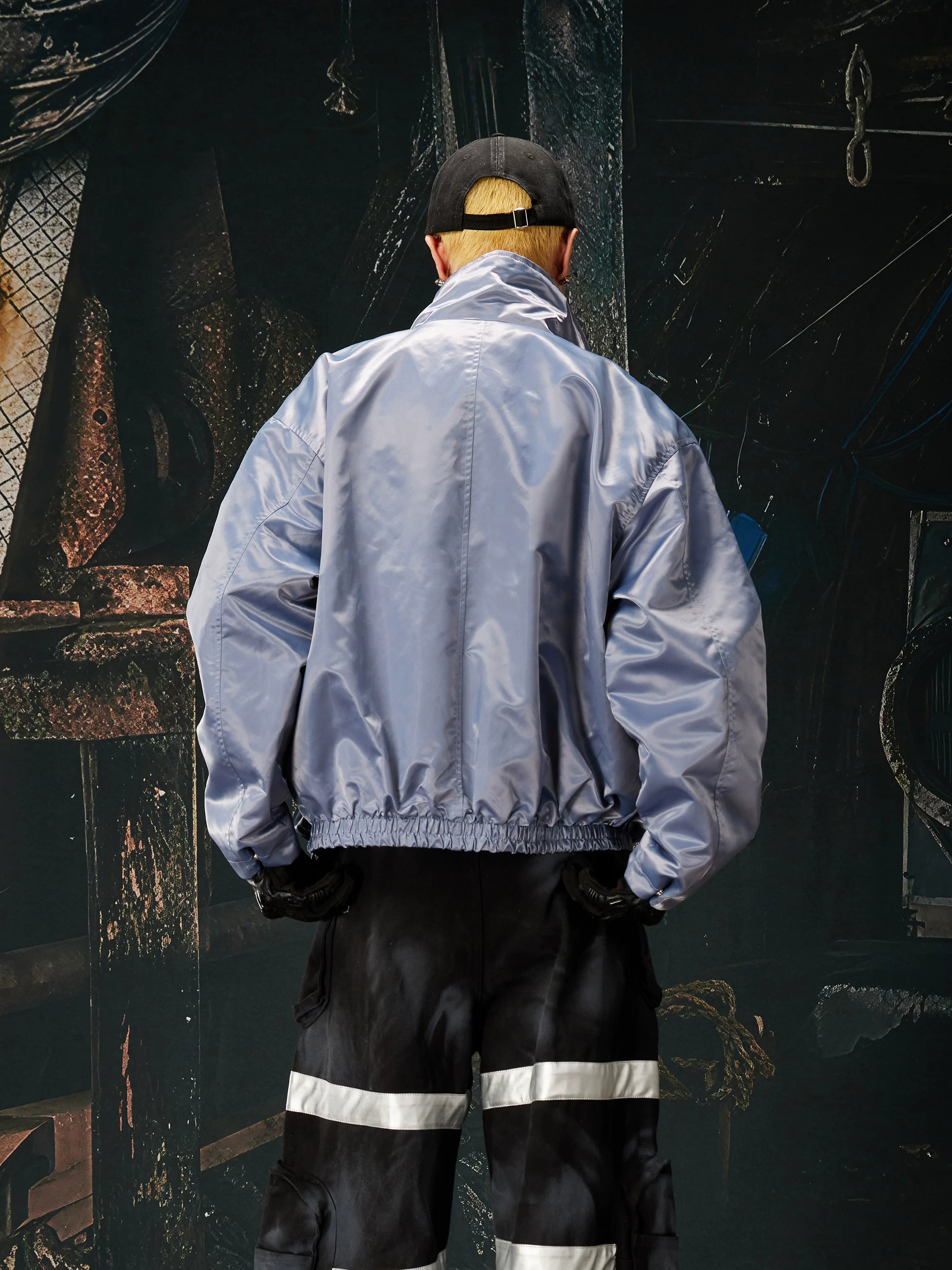 NOMANIAI Glossy-finish custom embroidered zip-up jacket.