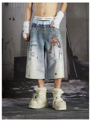 NOMANIAI Y2K-style loose-fit cropped pants featuring a triple-waistband design and chain charm detail.