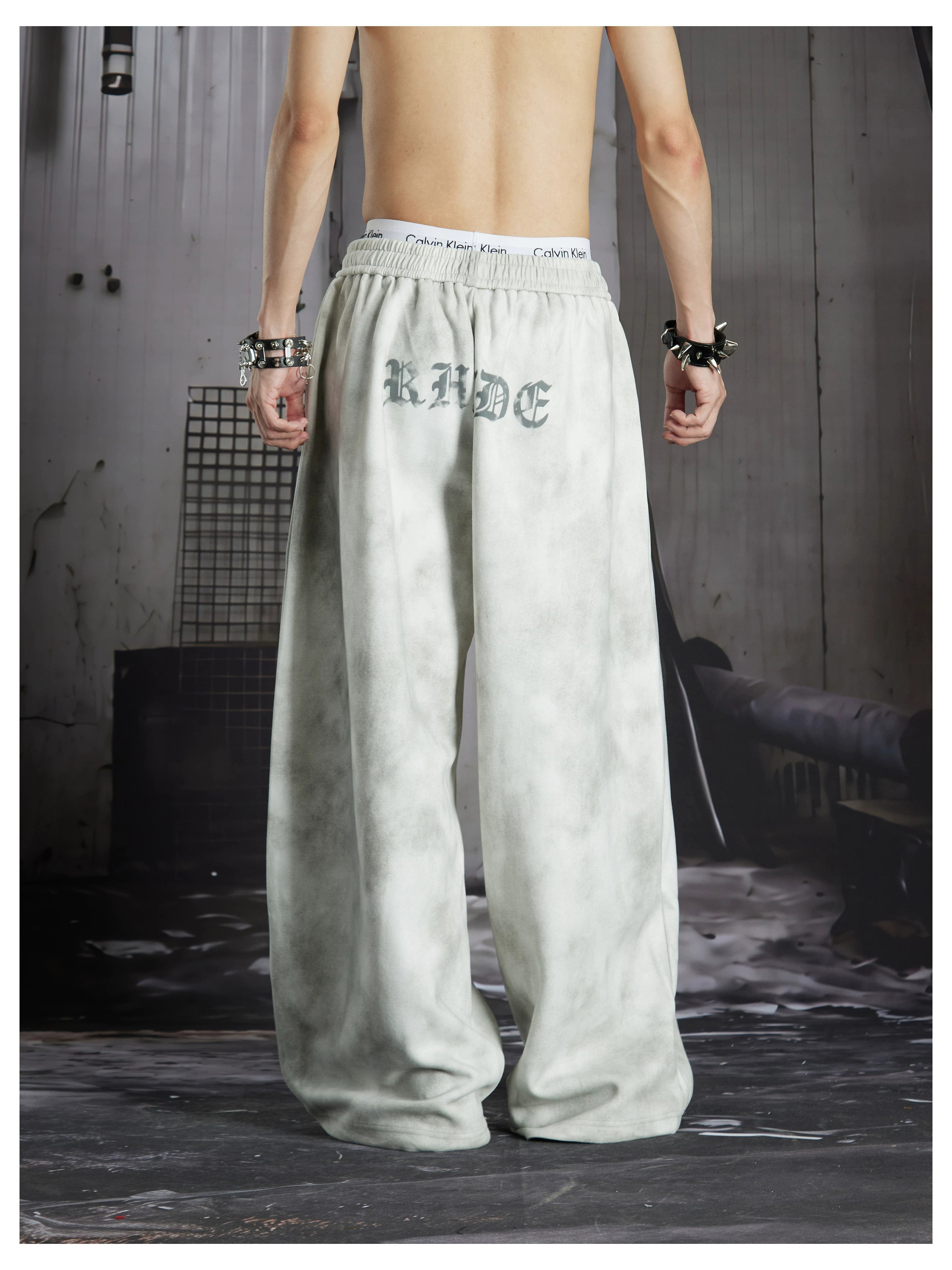 NOMANIAI  Y2K Cross-Print Tie-Dye Loose-Fit Casual Pants with Elastic Waist.