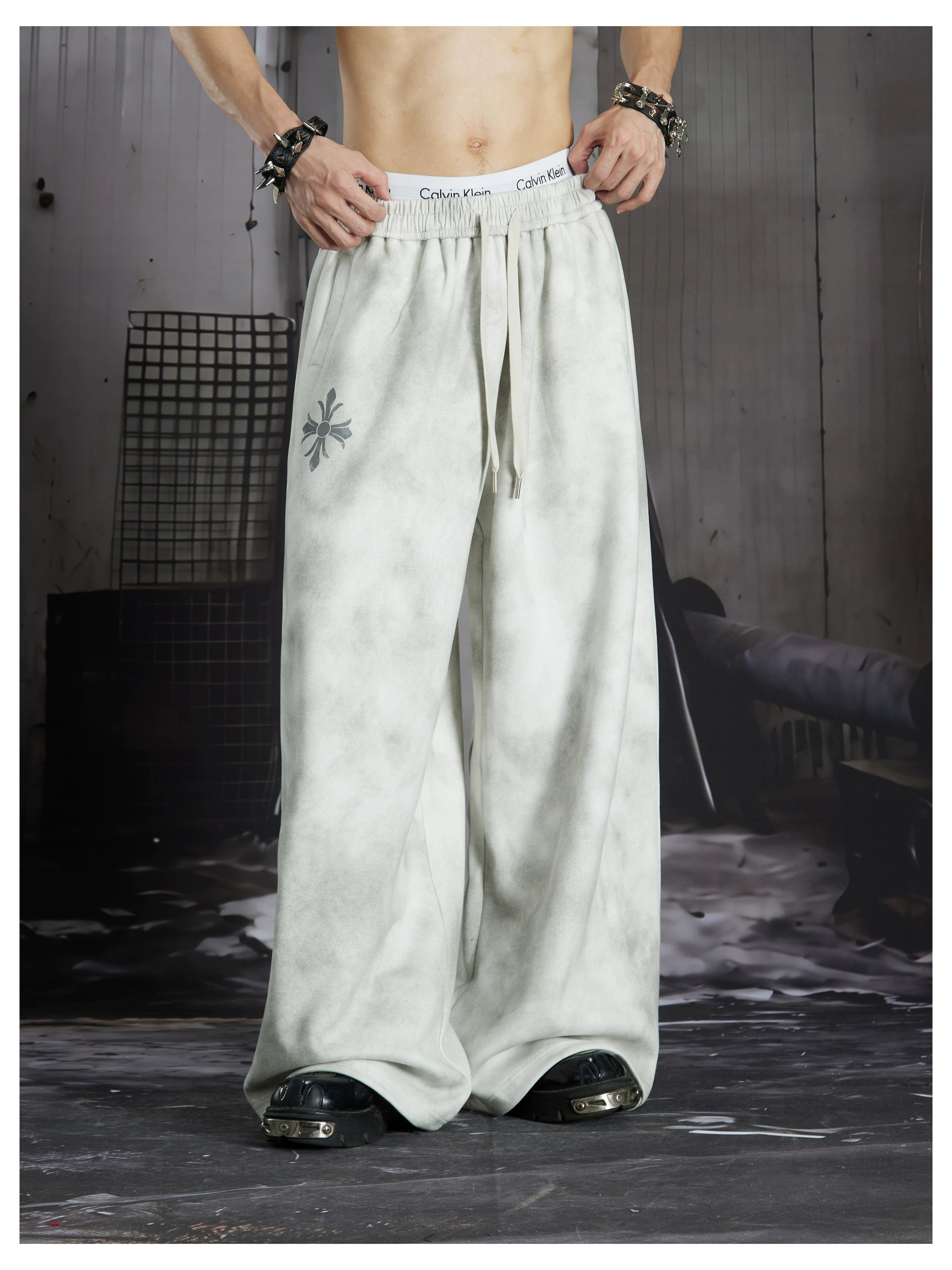 NOMANIAI  Y2K Cross-Print Tie-Dye Loose-Fit Casual Pants with Elastic Waist.