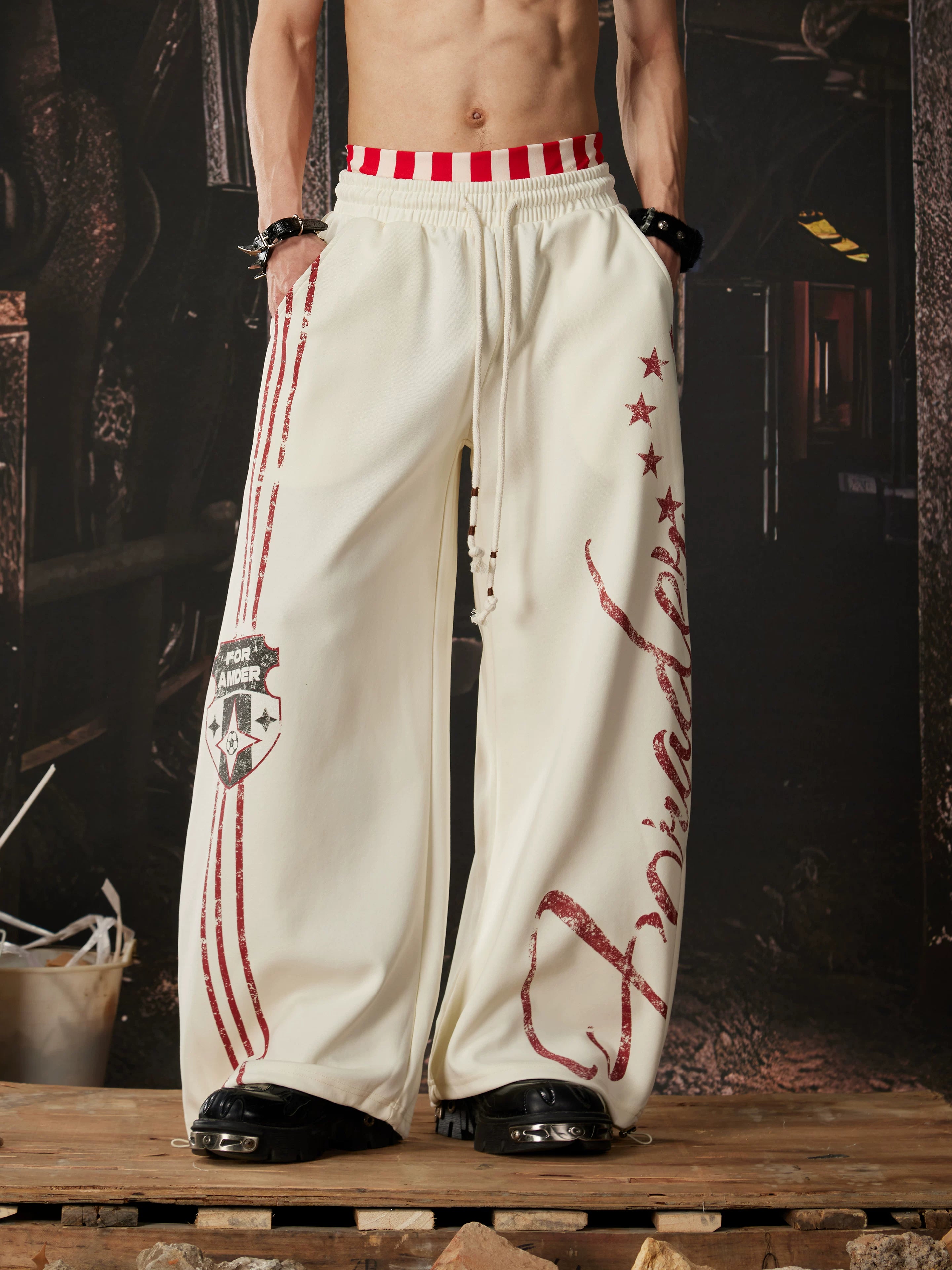 NOMANIAI  Printed Y2K loose-fit casual pants with double-waistband detail.