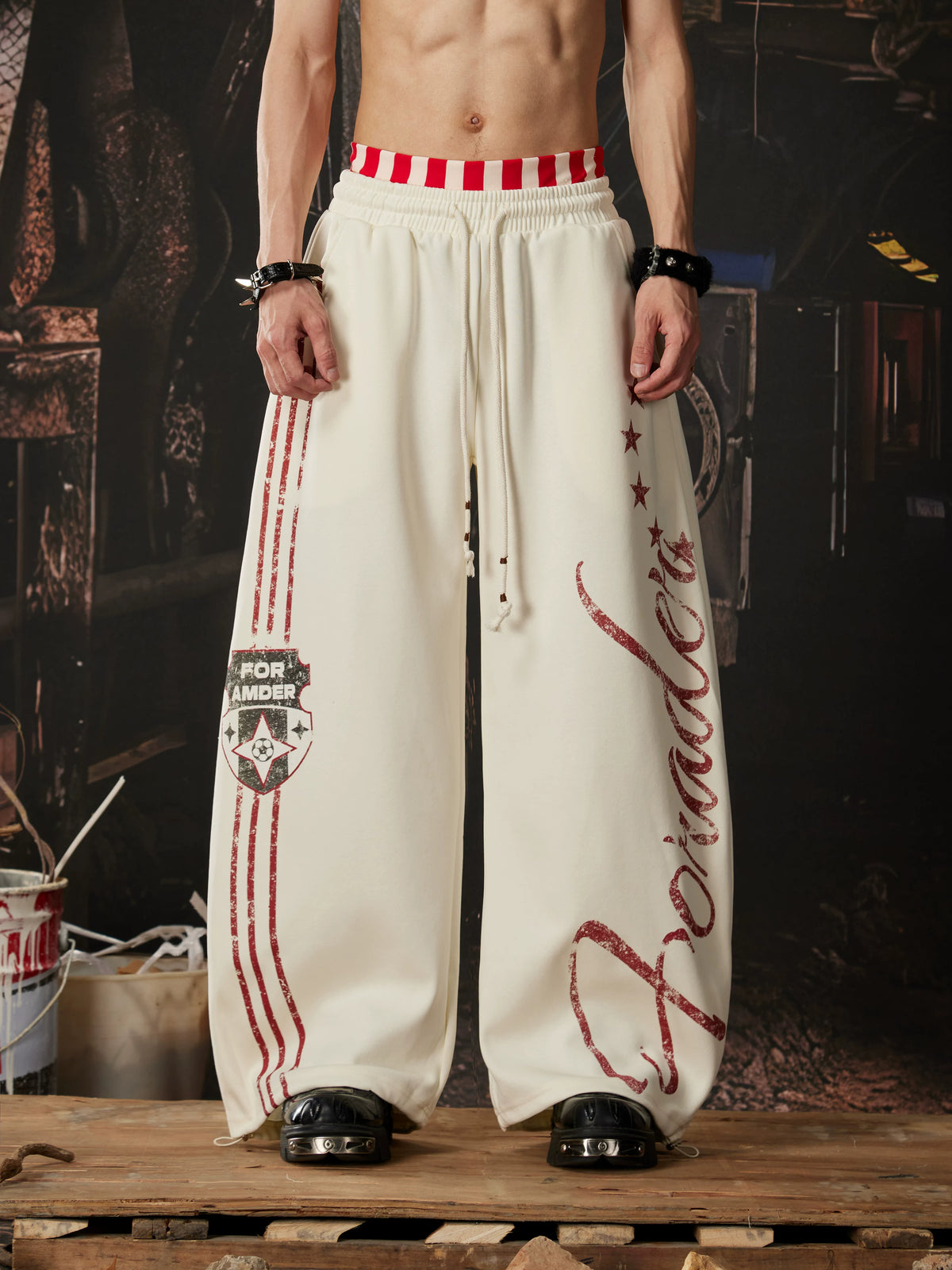 NOMANIAI  Printed Y2K loose-fit casual pants with double-waistband detail.