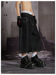 NOMANIAI Cropped jeans with rhinestone and embroidery totem design.