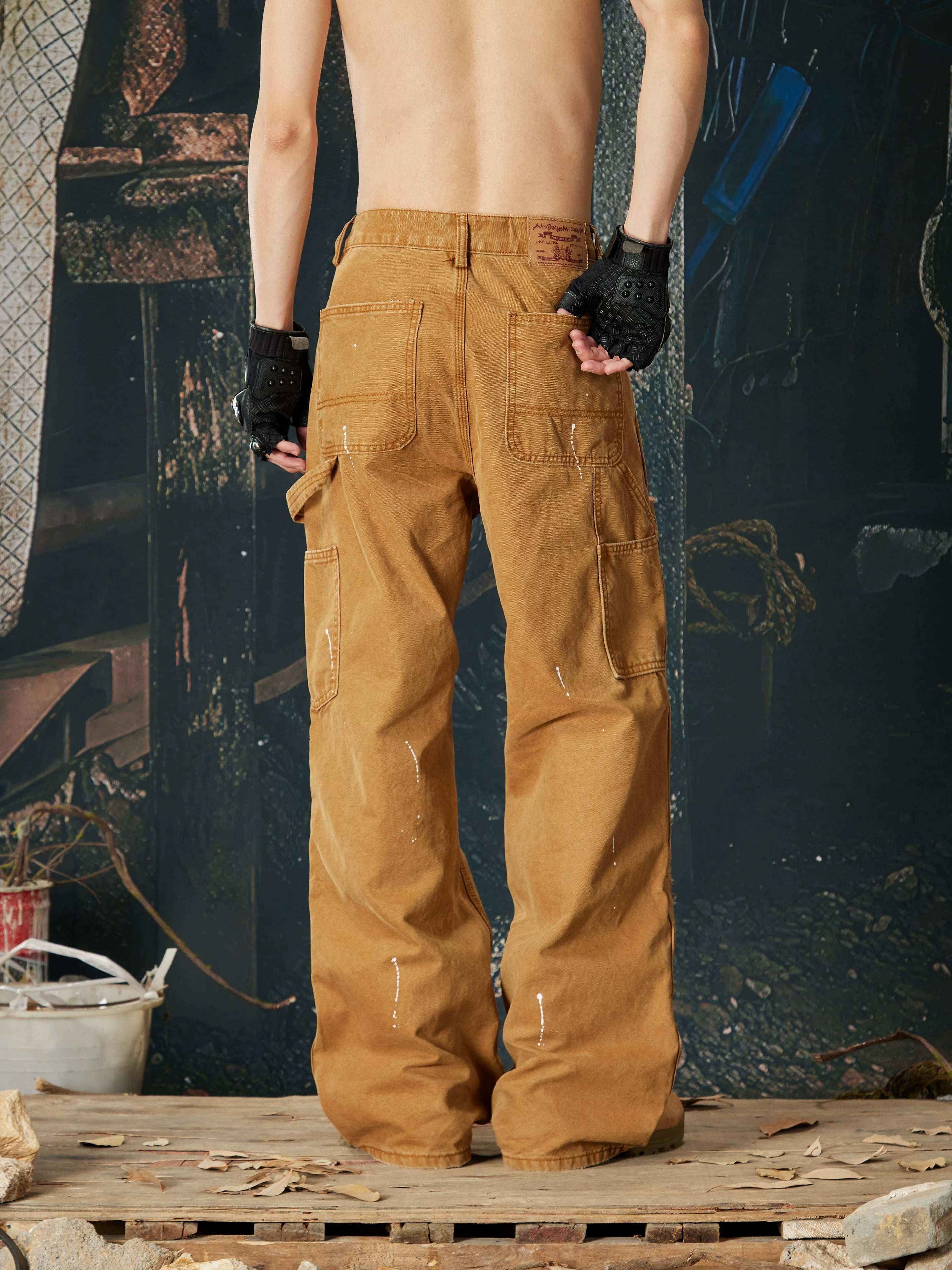 NOMANIAI Multi-process distressed casual cargo pants.