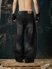 NOMANIAI Loose-fit, washed, and distressed jeans with 3D tailoring.