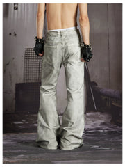 NOMANIAI Dark Street-Style Denim Jeans with Angel Wing Embroidery and Studs.