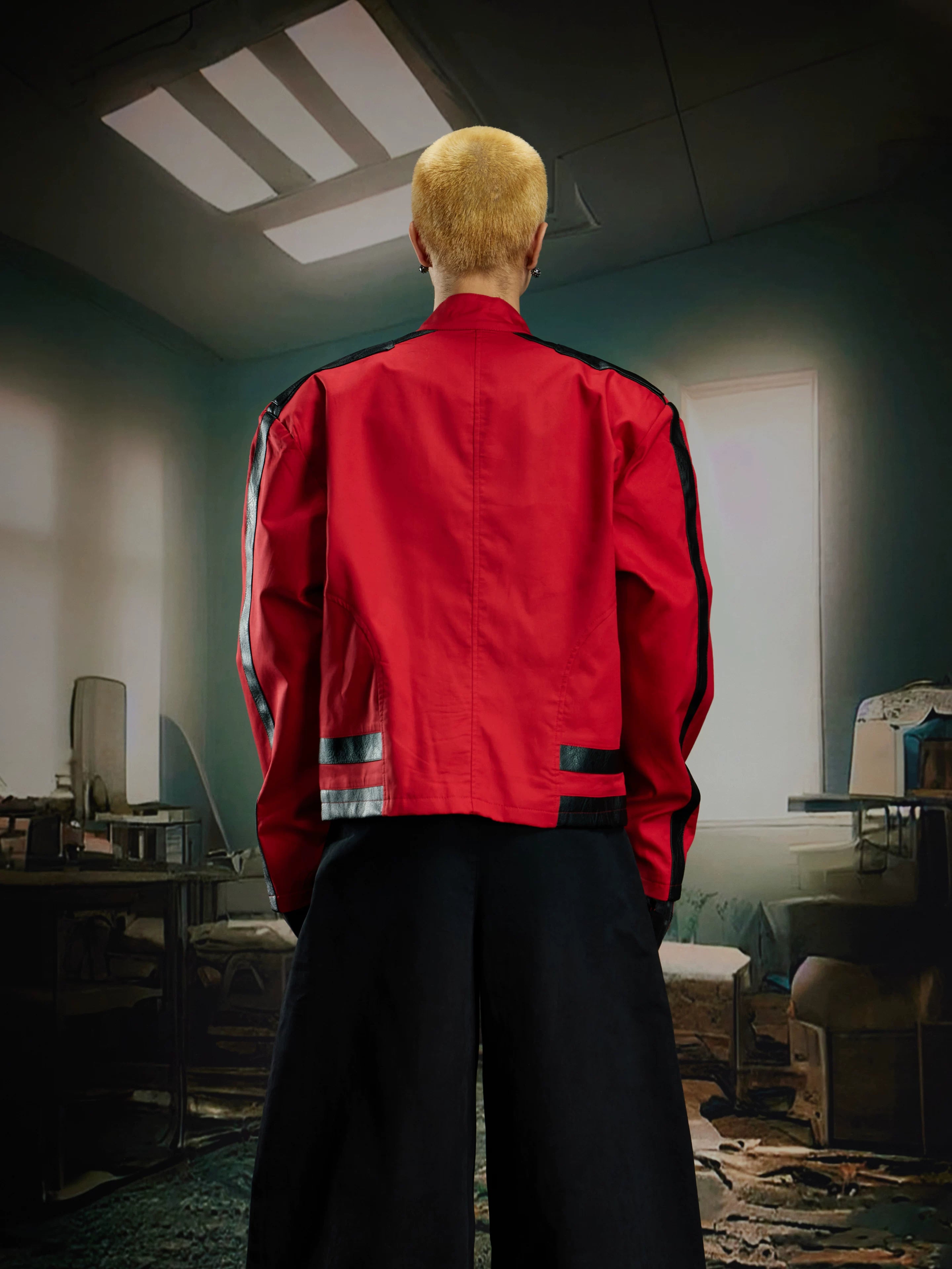 NOMANIAI Cropped stand-collar moto jacket with PU leather paneling and zip closure.