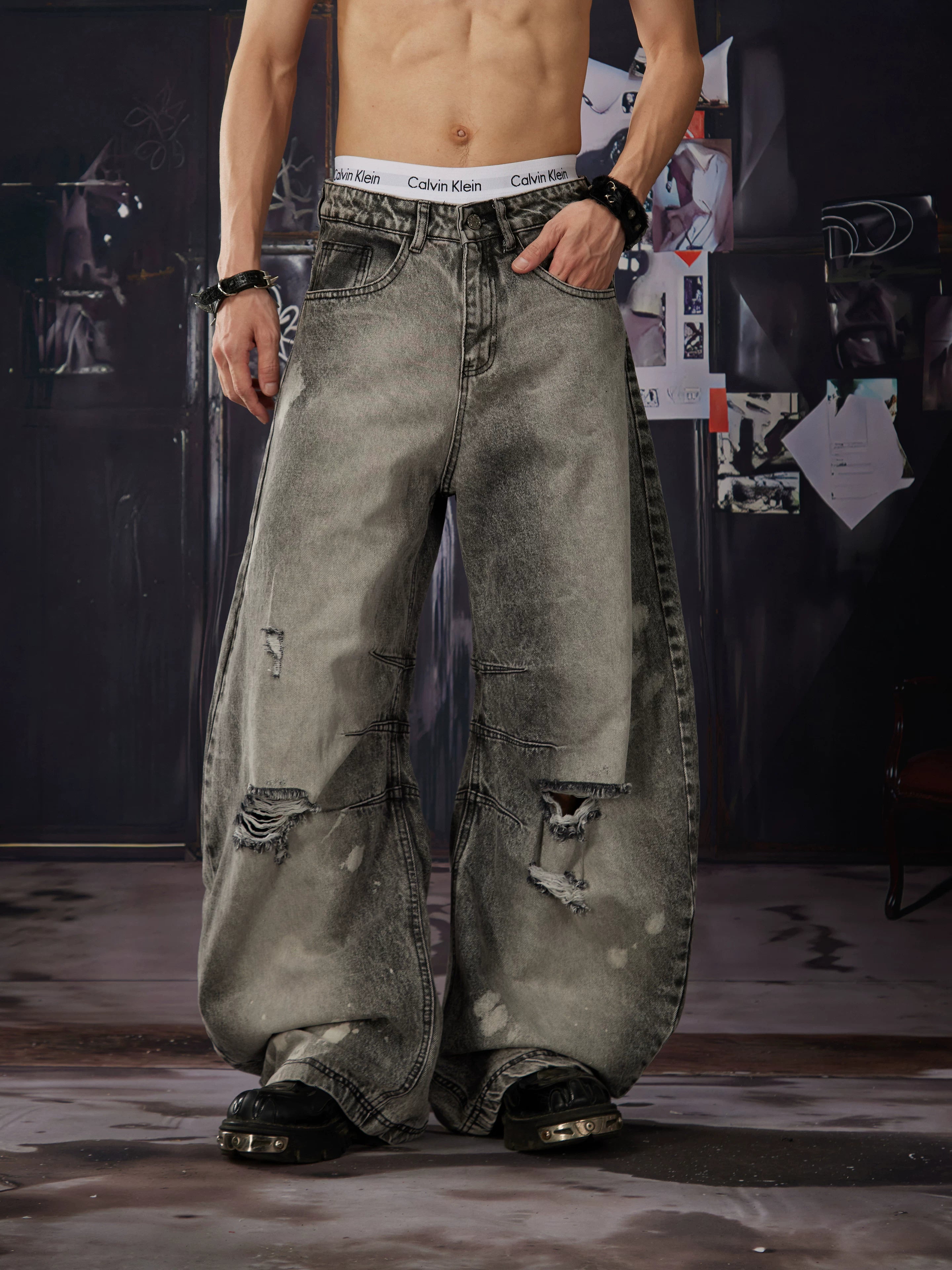 NOMANIAI  Distressed, washed, and vintage-look loose wide-leg jeans.