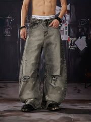 NOMANIAI  Distressed, washed, and vintage-look loose wide-leg jeans.