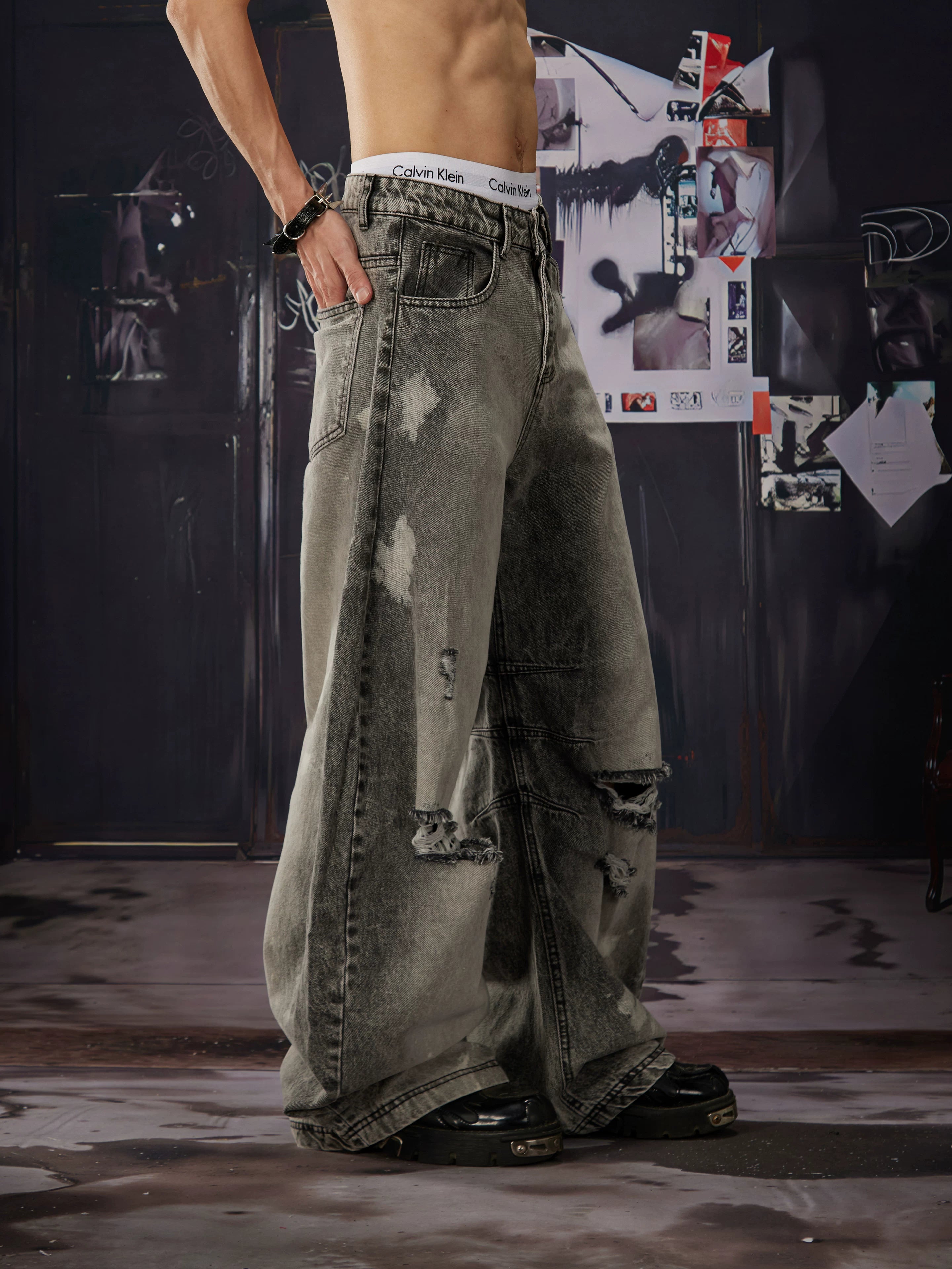 NOMANIAI  Distressed, washed, and vintage-look loose wide-leg jeans.