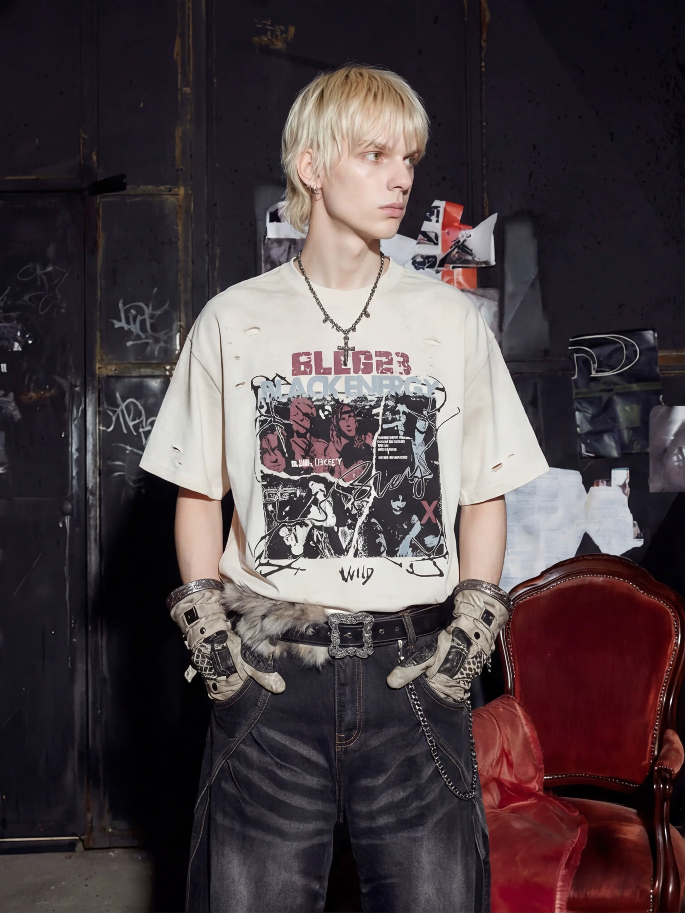 NOMANIAI Distressed Short-Sleeve T-Shirt with Rips and Vintage-Style Print.