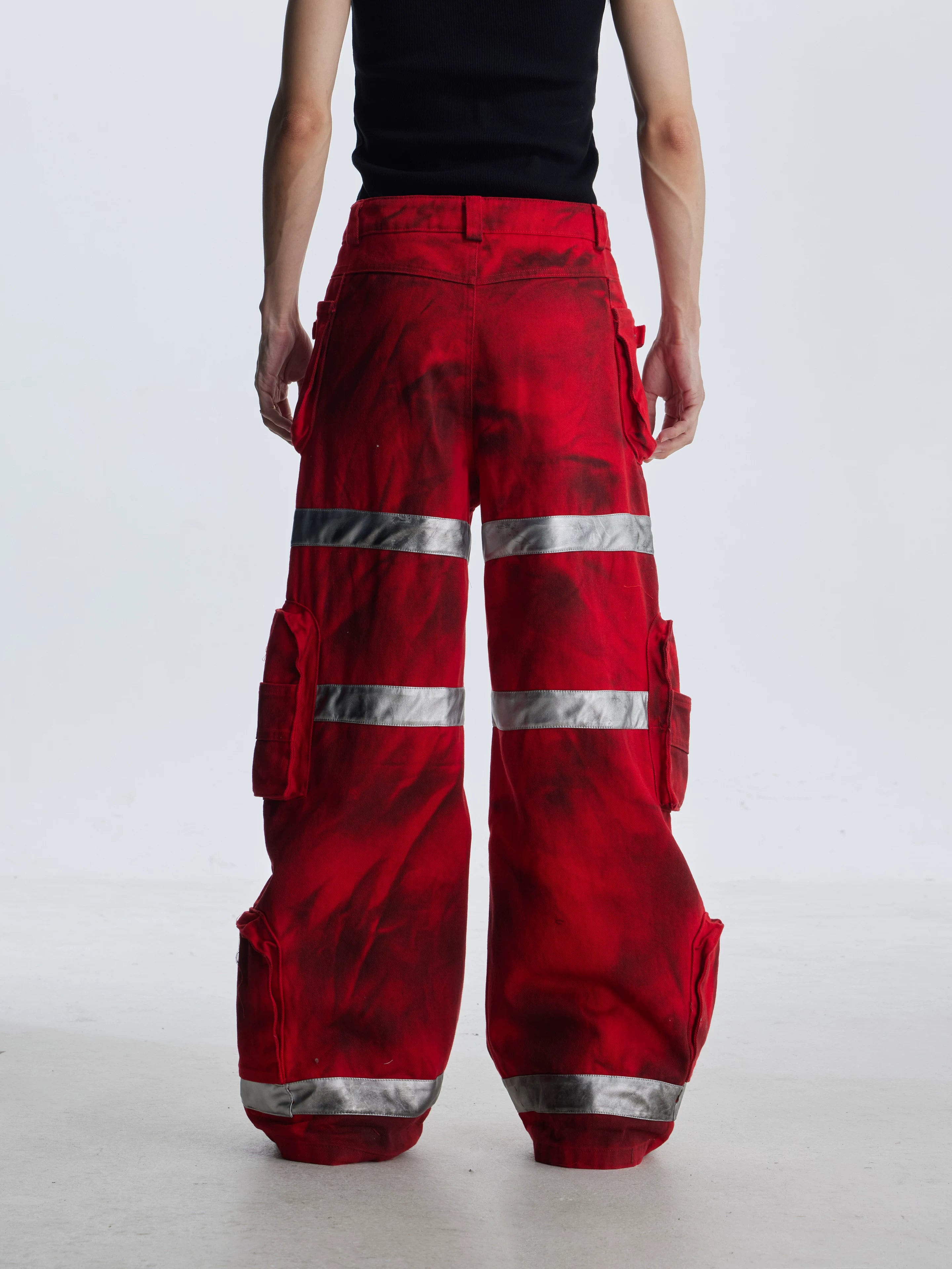NOMANIAI Heavy-duty streetwear wide-leg denim trousers.