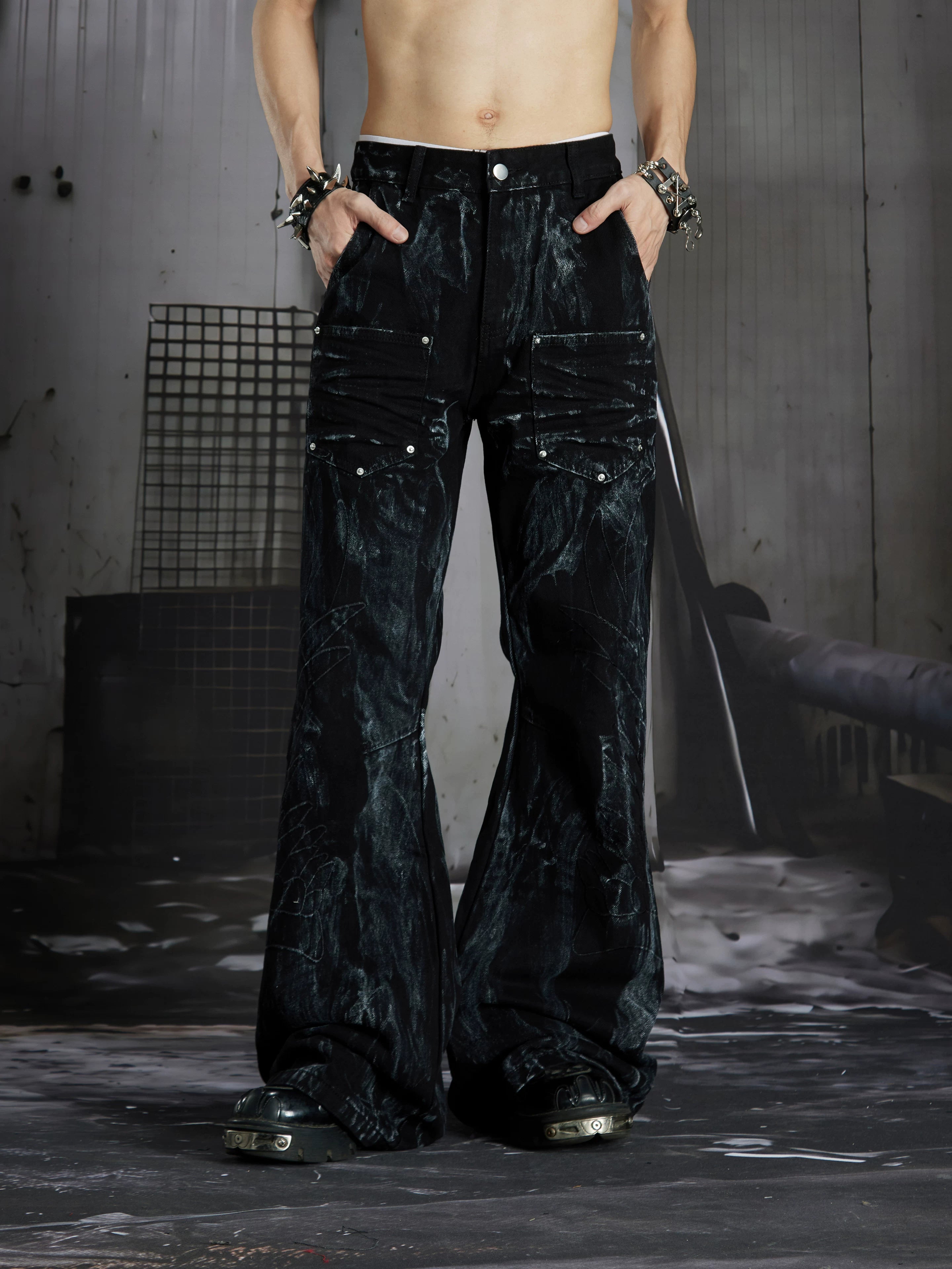 NOMANIAI Dark Street-Style Denim Jeans with Angel Wing Embroidery and Studs.