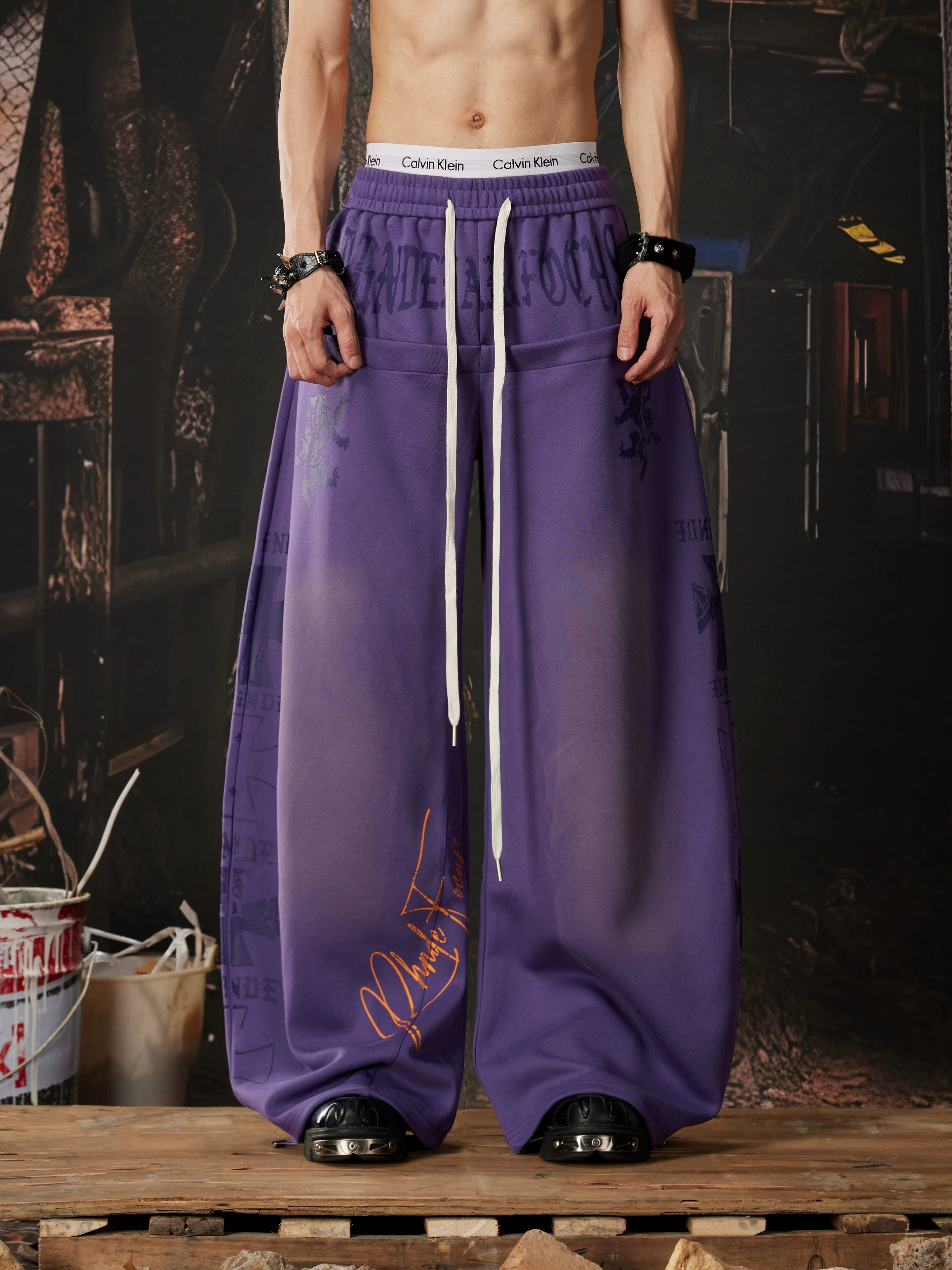 NOMANIAI Light-toned totem print Y2K loose-fit casual pants.