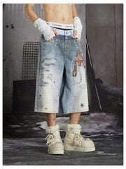 NOMANIAI Y2K-style loose-fit cropped pants featuring a triple-waistband design and chain charm detail.