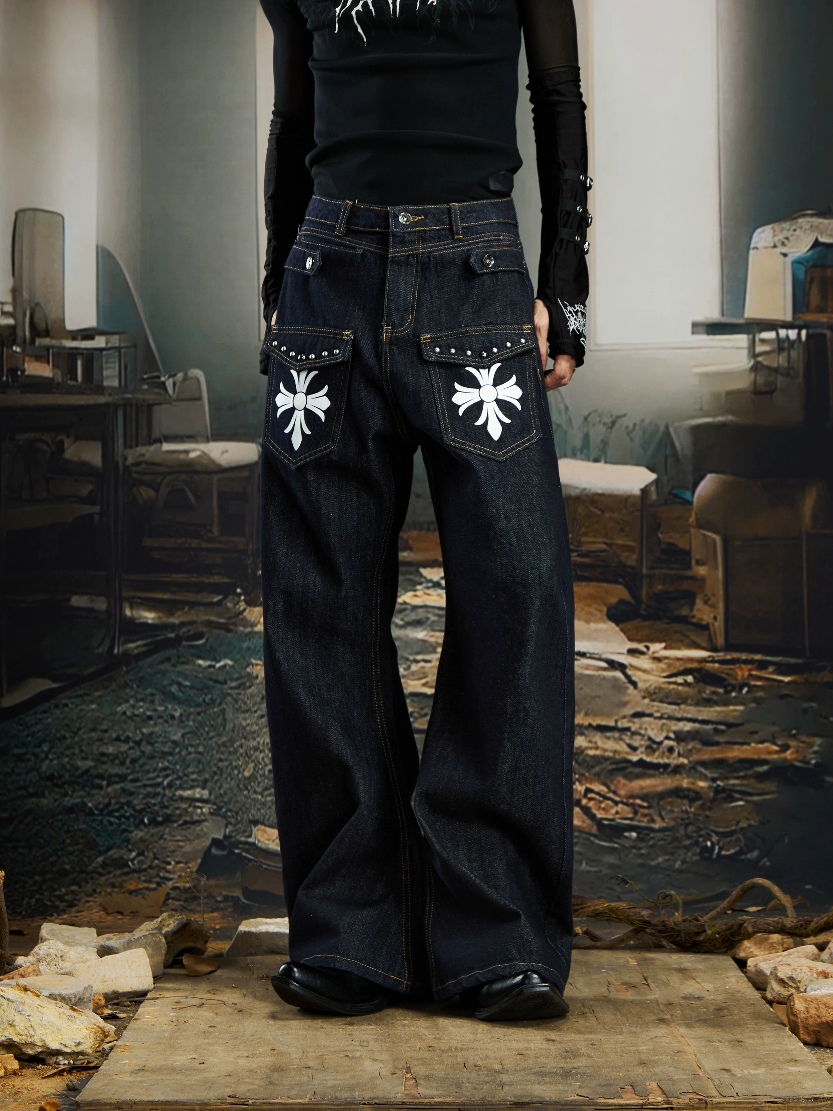 NOMANIAI  Printed, studded, deconstructed "Scimitar" jeans—versatile trousers.