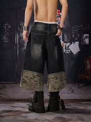 NOMANIAI Loose-fit, cropped pants featuring a "faux-layered" design, camouflage print, and a washed, distressed finish.