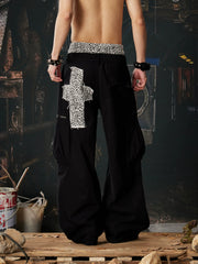 NOMANIAI Leopard-print double-waistband panelled cotton cargo pants.