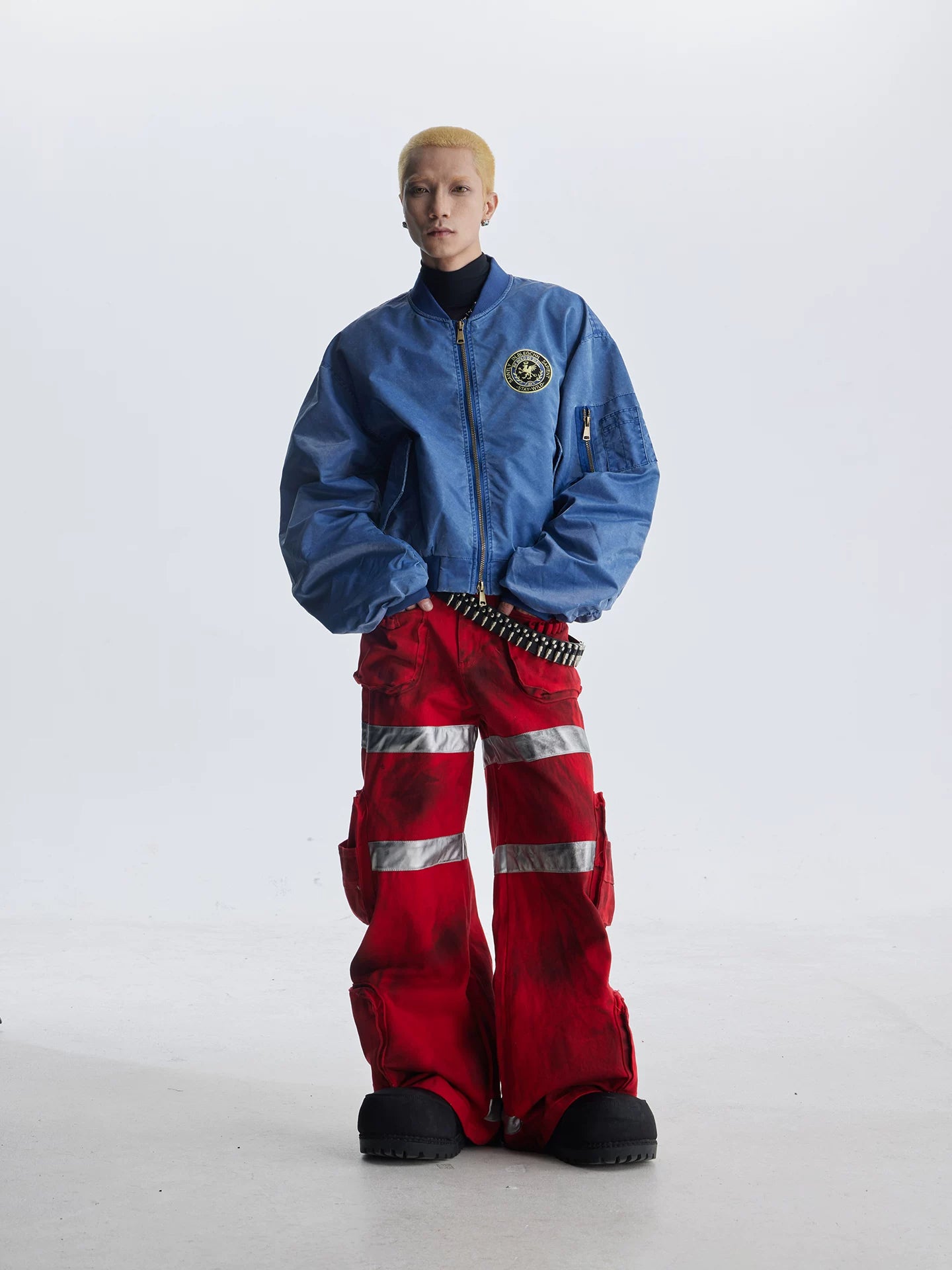 NOMANIAI Heavy-duty streetwear wide-leg denim trousers.