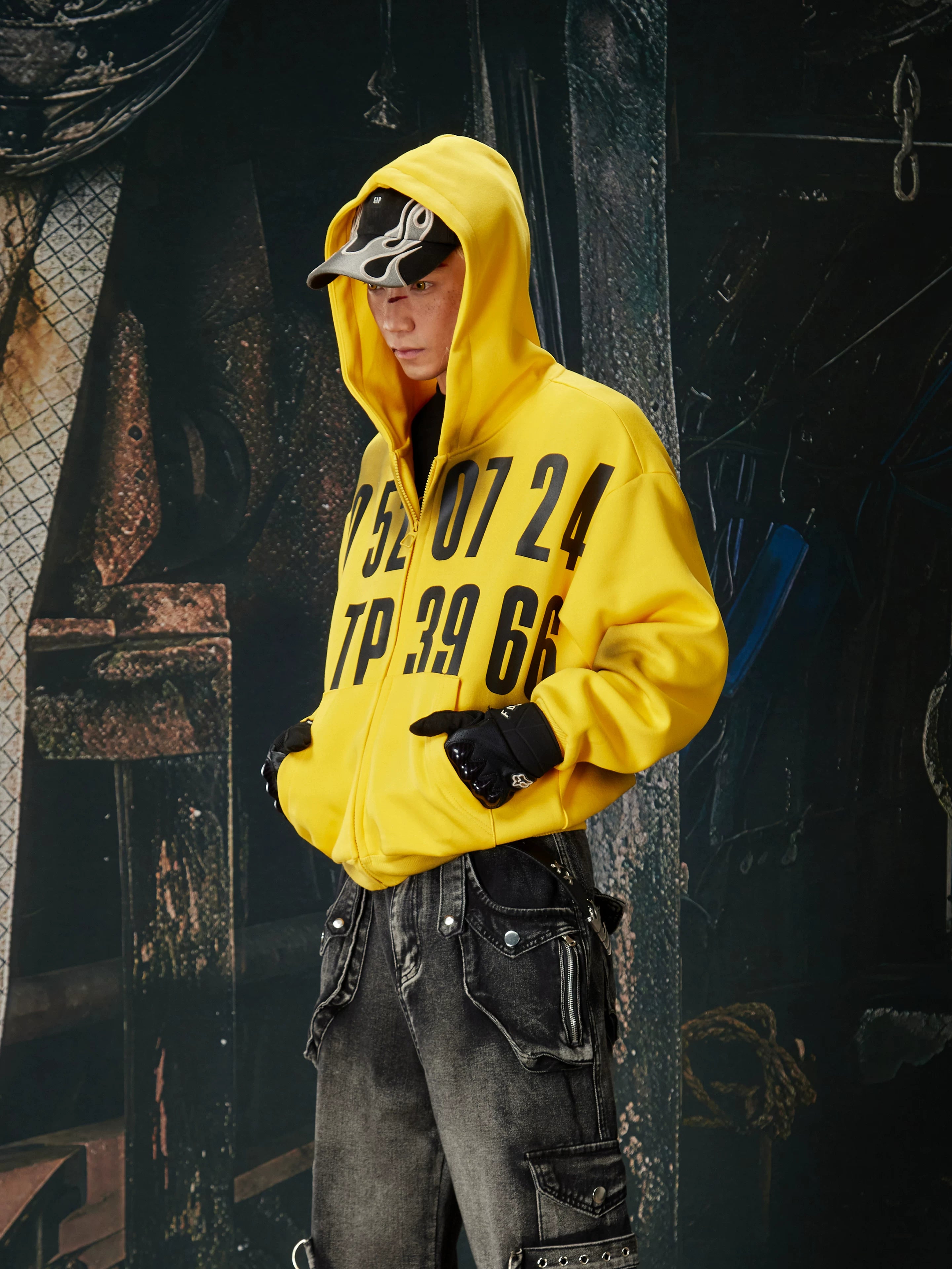 NOMANIAI  Oversized Printed Distressed Zip-Up Hoodie.