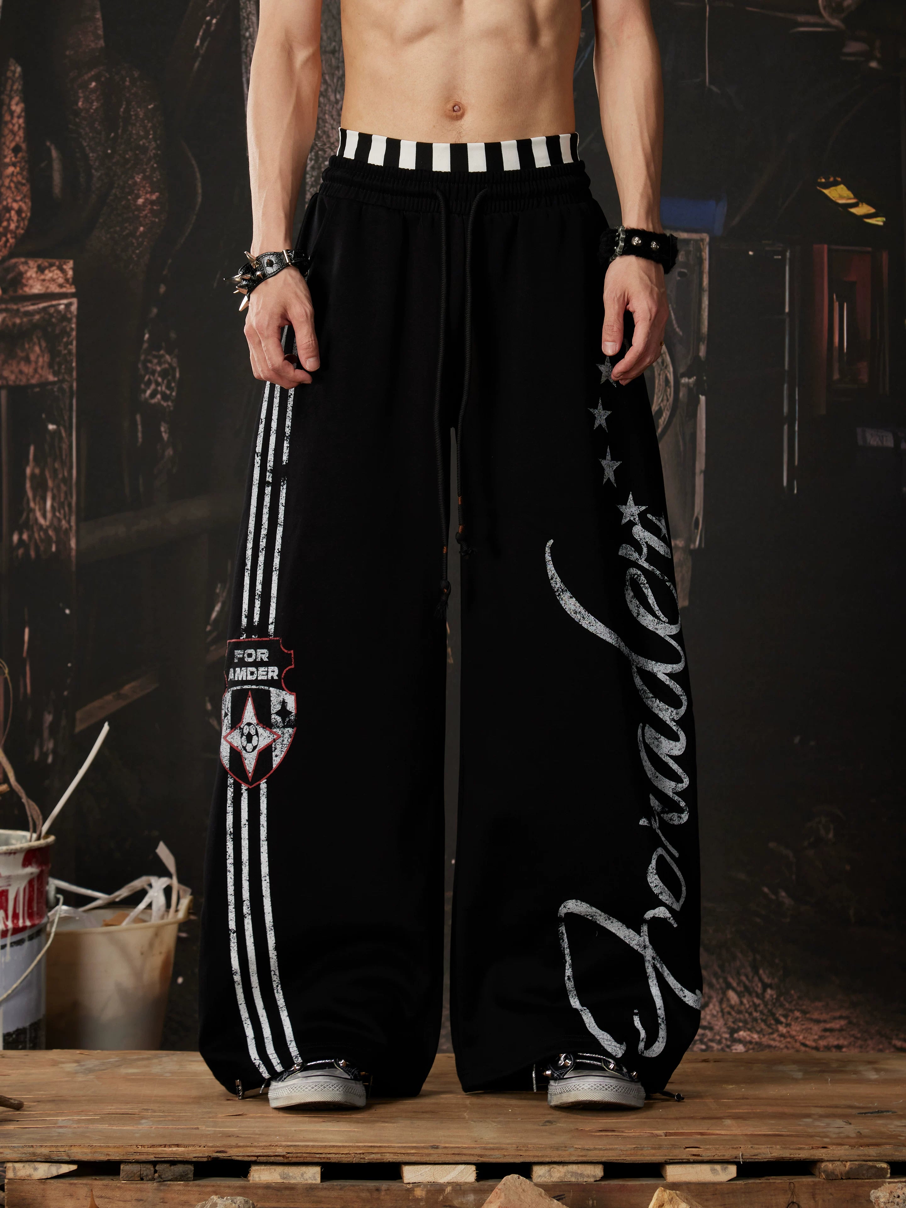 NOMANIAI  Printed Y2K loose-fit casual pants with double-waistband detail.