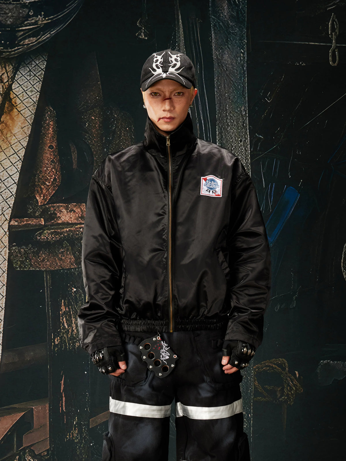 NOMANIAI Glossy-finish custom embroidered zip-up jacket.
