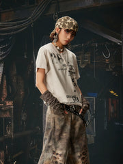 NOMANIAI Vintage-style distressed graphic short-sleeve T-shirt.